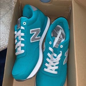 Blue and grey new balances